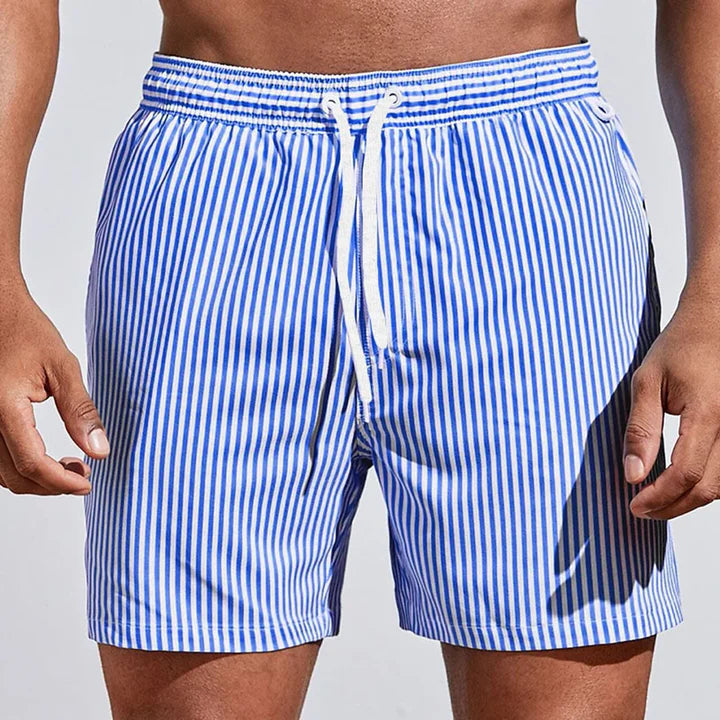 https://cdn.shopify.com/s/files/1/0913/7753/3275/files/Mens-Swim-Shorts-Casual-Quick-Dry-Beachwear-2.jpg?v=1773062397
