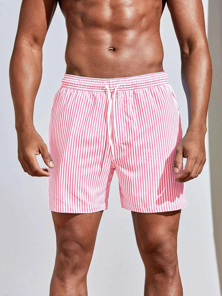 https://cdn.shopify.com/s/files/1/0913/7753/3275/files/Mens-Swim-Shorts-Casual-Quick-Dry-Beachwear.jpg?v=1773062394