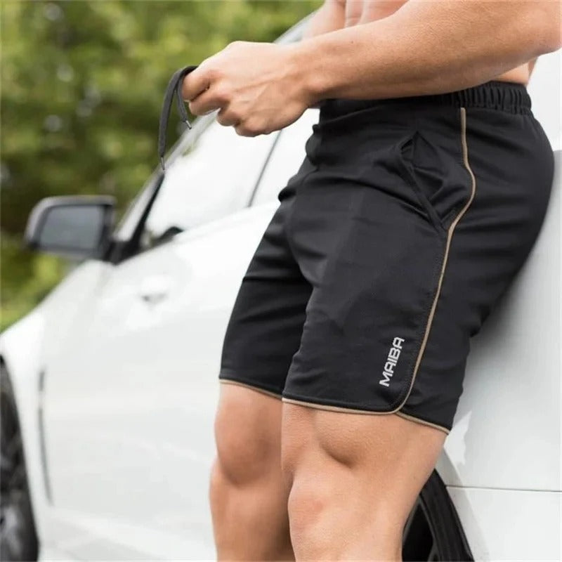 https://cdn.shopify.com/s/files/1/0913/7753/3275/files/Mens-Swim-Shorts-Slim-Fit-for-Beach-Pool-5.jpg?v=1773061917