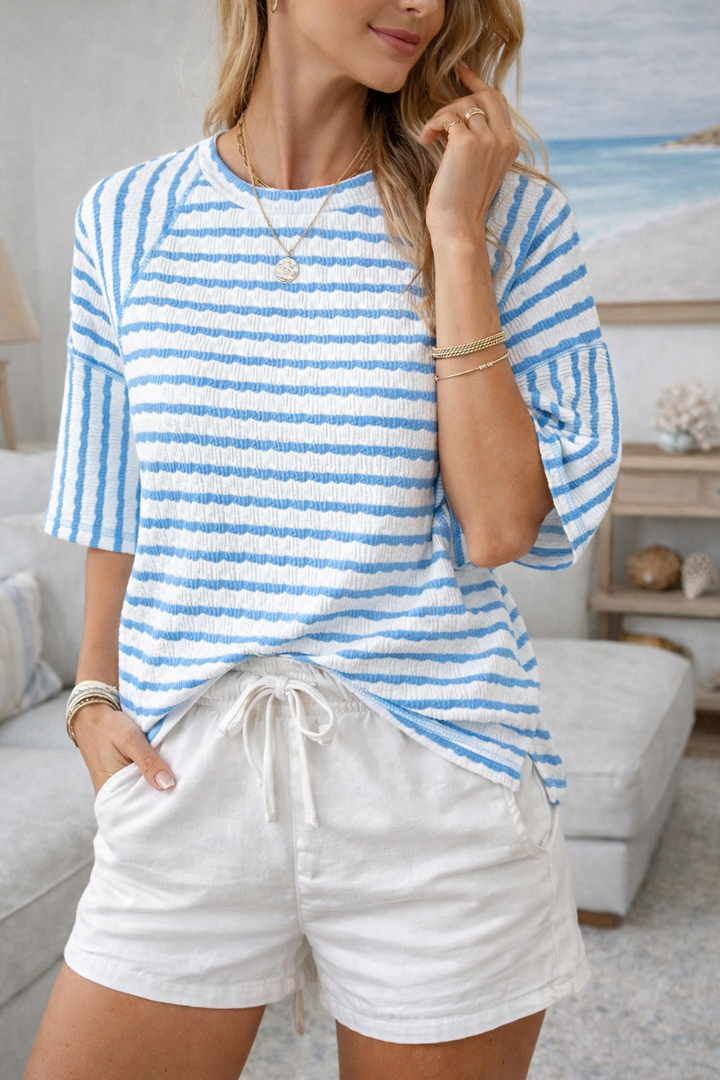https://cdn.shopify.com/s/files/1/0830/7487/5738/files/Mia___Effortless_and_Breathable_Striped_Relaxed_T-Shirt_1.png?v=1778598151