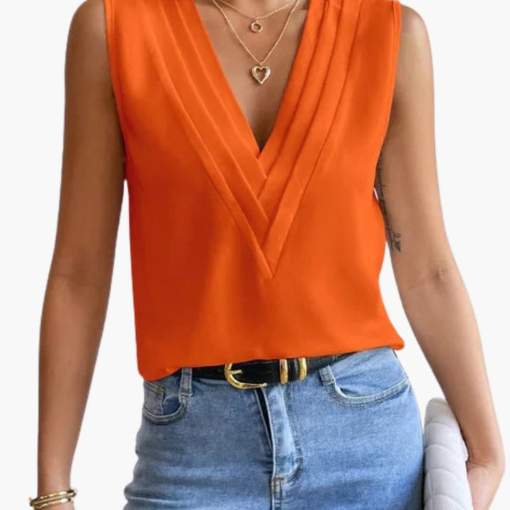 https://cdn.shopify.com/s/files/1/0830/7487/5738/files/Morgan___Elegant_V-Neck_Sleeveless_Draped_Blouse_3.jpg?v=1778598150