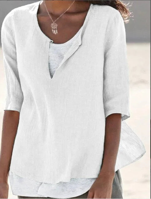 https://cdn.shopify.com/s/files/1/0830/7487/5738/files/Nora___Relaxed_Linen_Blend_Layered_Hem_Blouse_1.jpg?v=1778598146