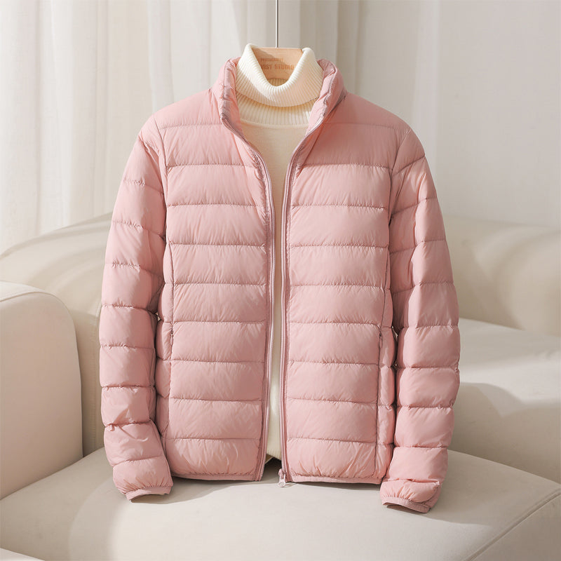 https://cdn.shopify.com/s/files/1/0830/7487/5738/files/SilvaHighCollarDownJacket3.jpg?v=1773741264