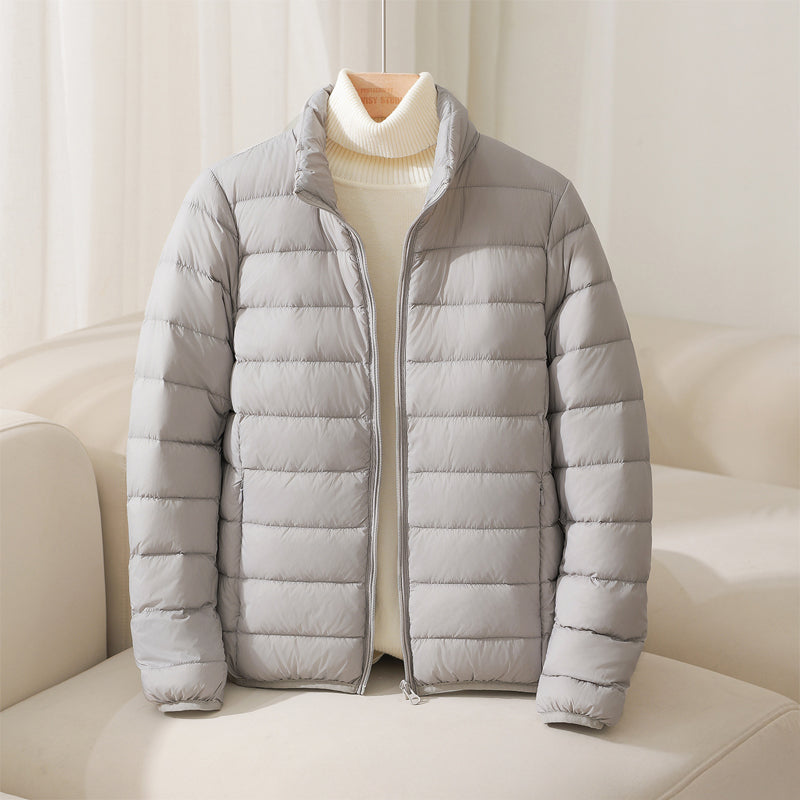 https://cdn.shopify.com/s/files/1/0830/7487/5738/files/SilvaHighCollarDownJacket4.jpg?v=1773741264
