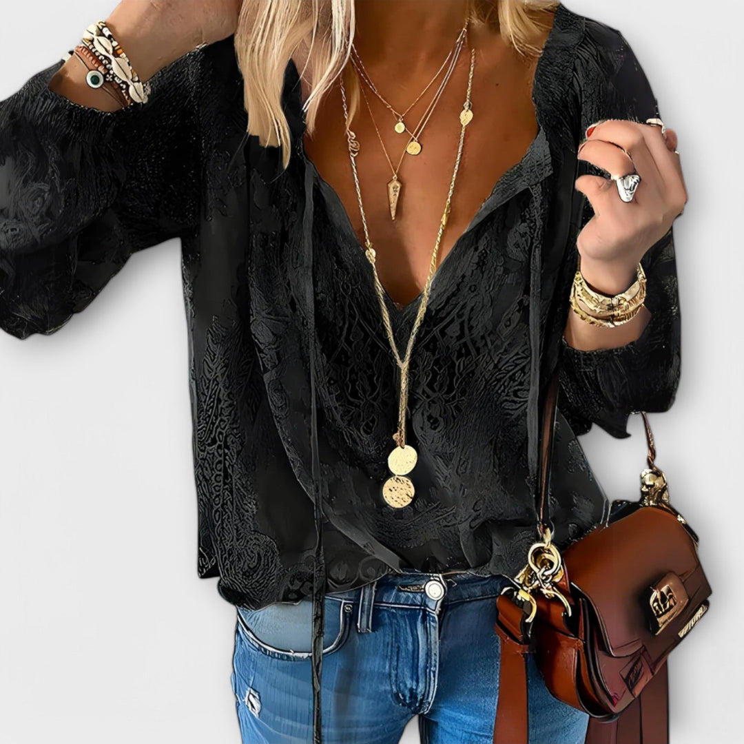 https://cdn.shopify.com/s/files/1/0830/7487/5738/files/Sophia___Elegant_V-Neck_Long_Sleeve_Lace_Blouse_1.jpg?v=1778598151