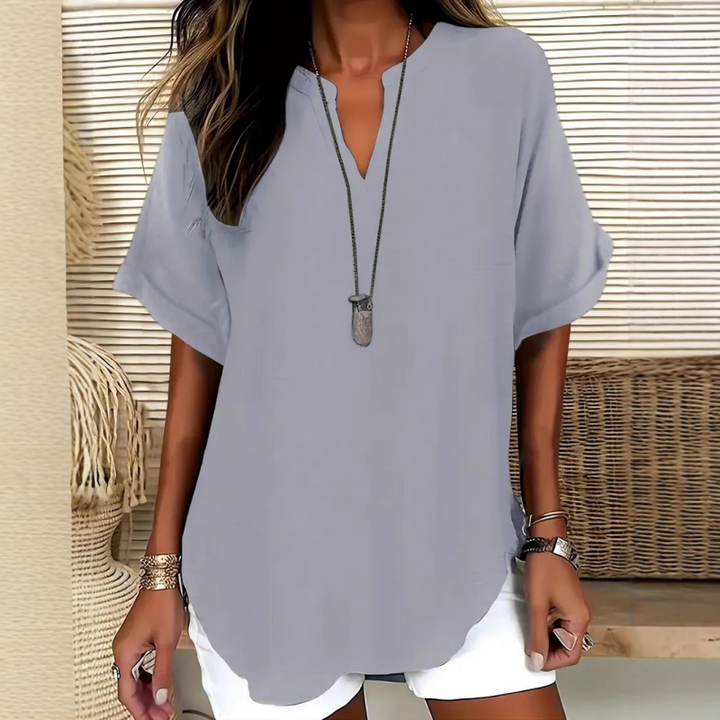https://cdn.shopify.com/s/files/1/0830/7487/5738/files/Sophie___Stylish_and_sophisticated_women_s_blouse_3.png?v=1778598148