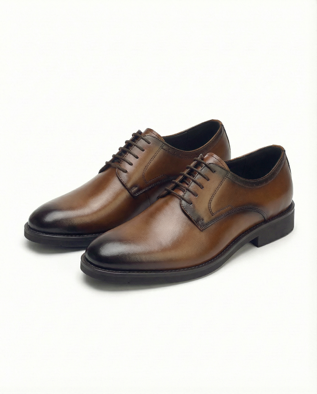 https://cdn.shopify.com/s/files/1/0830/7487/5738/files/freepik__highquality-studio-product-photo-of-brown-shoes-ma__17019.png?v=1778082437