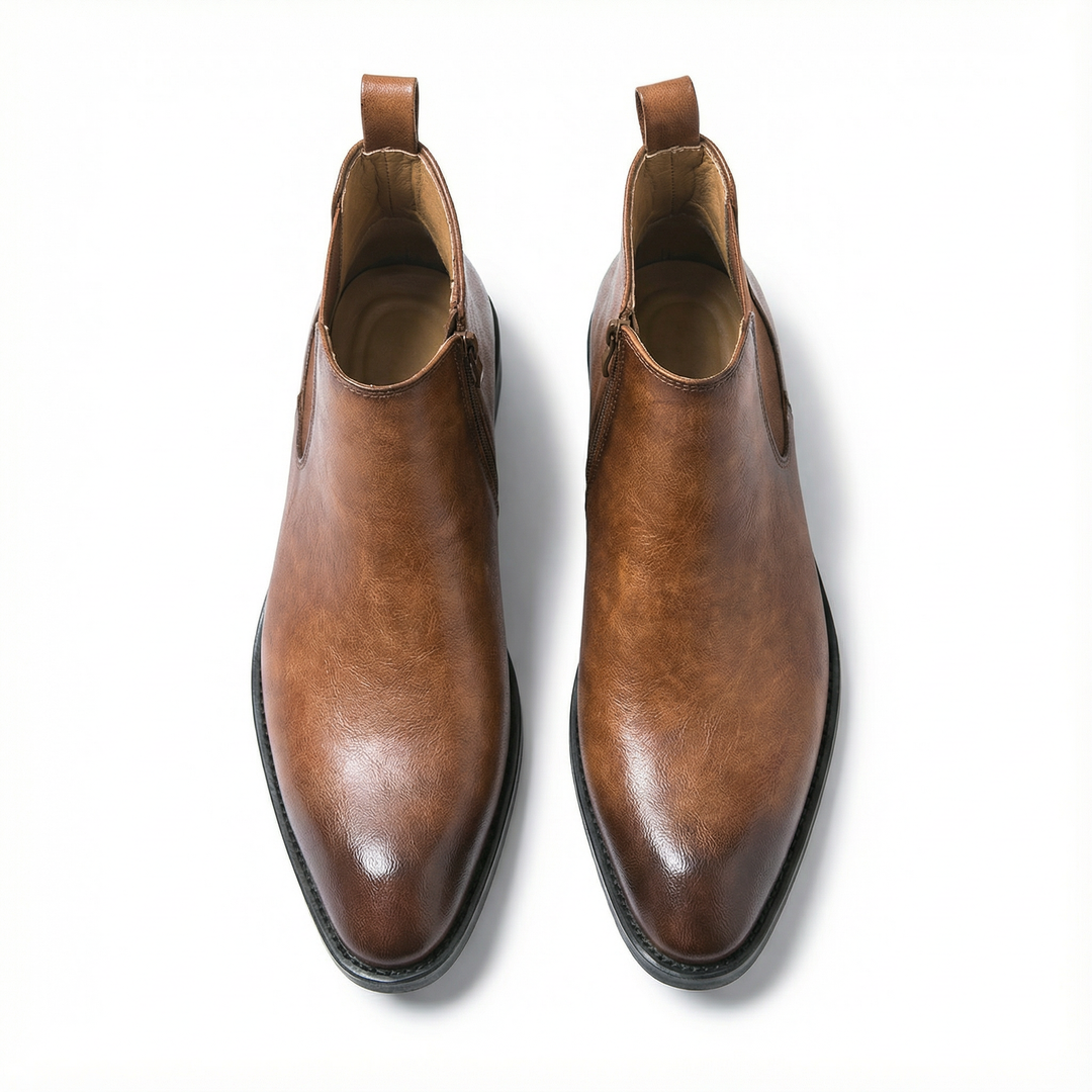 https://cdn.shopify.com/s/files/1/0830/7487/5738/files/freepik__highquality-topdown-studio-photo-of-a-cheslea-boot__29253.png?v=1778082461
