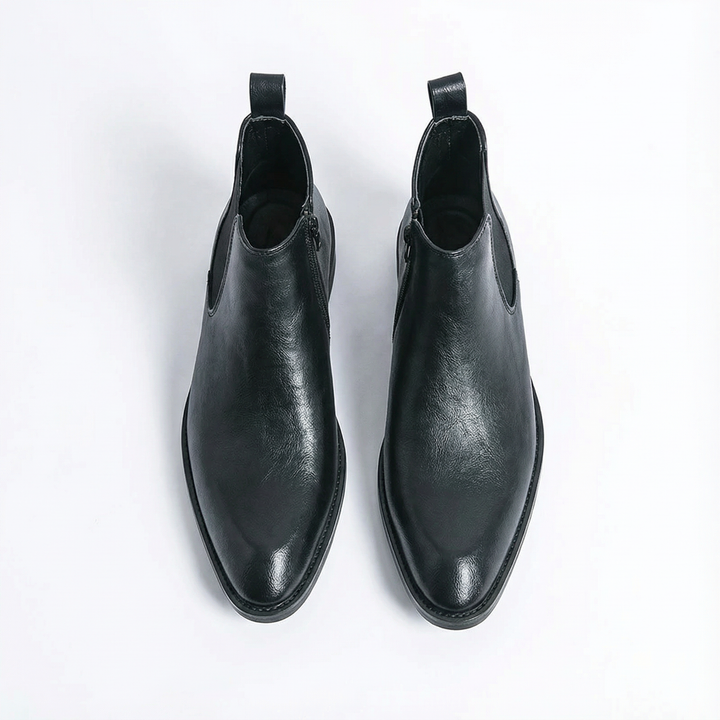 https://cdn.shopify.com/s/files/1/0830/7487/5738/files/freepik__highquality-topdown-studio-photo-of-a-cheslea-boot__29254.png?v=1778082461