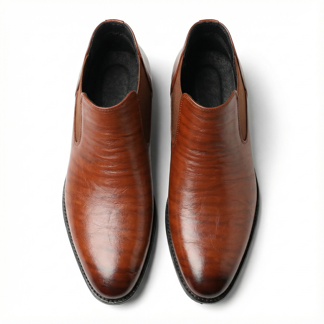 https://cdn.shopify.com/s/files/1/0830/7487/5738/files/freepik__highquality-topdown-studio-photo-of-a-pair-of-boot__13073.png?v=1778082460