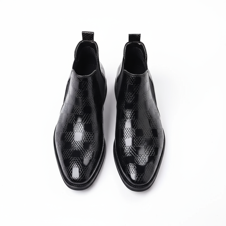 https://cdn.shopify.com/s/files/1/0830/7487/5738/files/freepik__highquality-topdown-studio-photo-of-cheslea-boots-__87710.png?v=1778082466