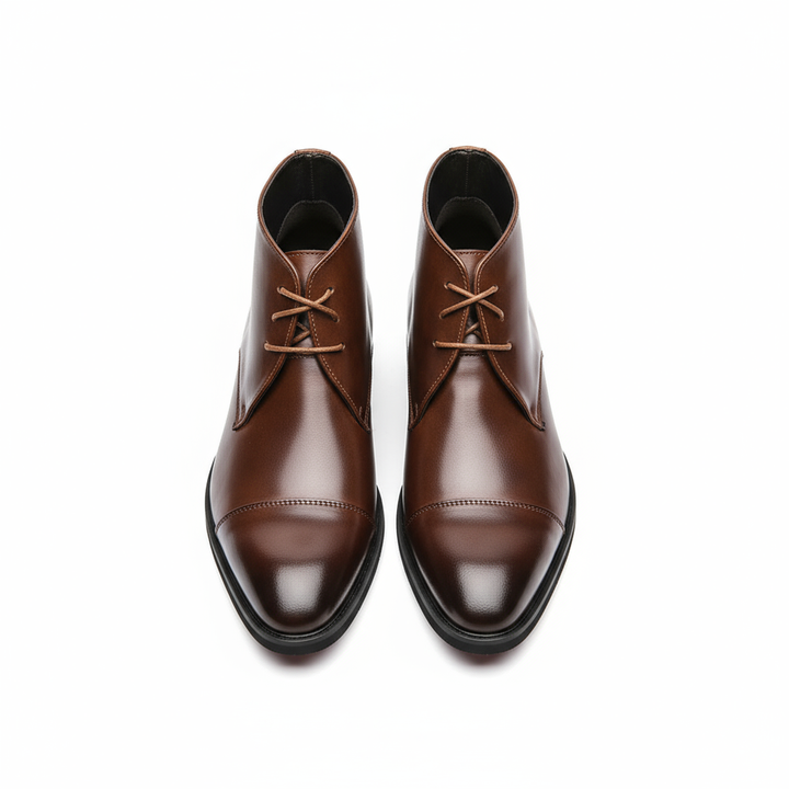 https://cdn.shopify.com/s/files/1/0830/7487/5738/files/freepik__highquality-topdown-studio-photo-of-chukka-boots-i__12554.png?v=1778082468