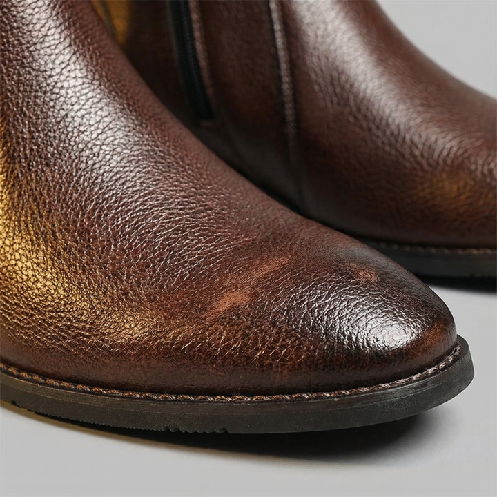 https://cdn.shopify.com/s/files/1/0830/7487/5738/files/freepik__macro-closeup-of-boot-made-from-full-grain-leather__30990.png?v=1778082461