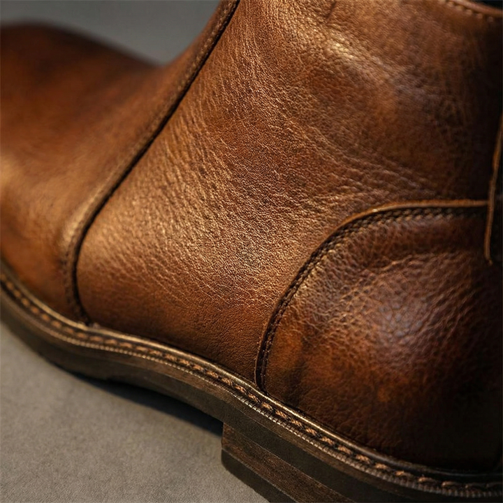 https://cdn.shopify.com/s/files/1/0830/7487/5738/files/freepik__macro-closeup-of-boot-made-from-full-grain-leather__30991.png?v=1778082460