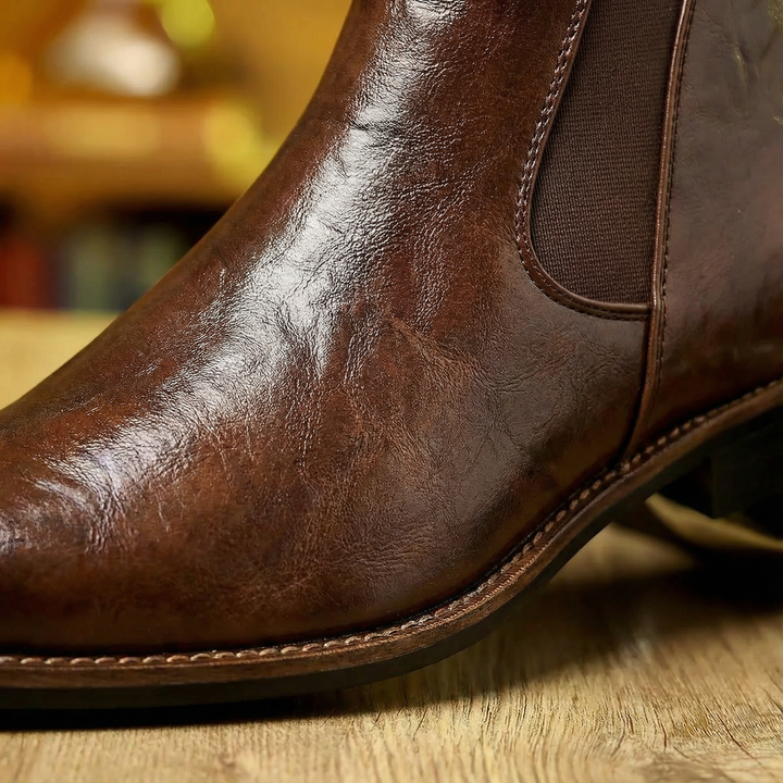 https://cdn.shopify.com/s/files/1/0830/7487/5738/files/freepik__macro-closeup-of-cheslea-boots-made-from-full-grai__31142_1477d492-3a8e-434c-9adc-1dc8073e9ae1.png?v=1778082464