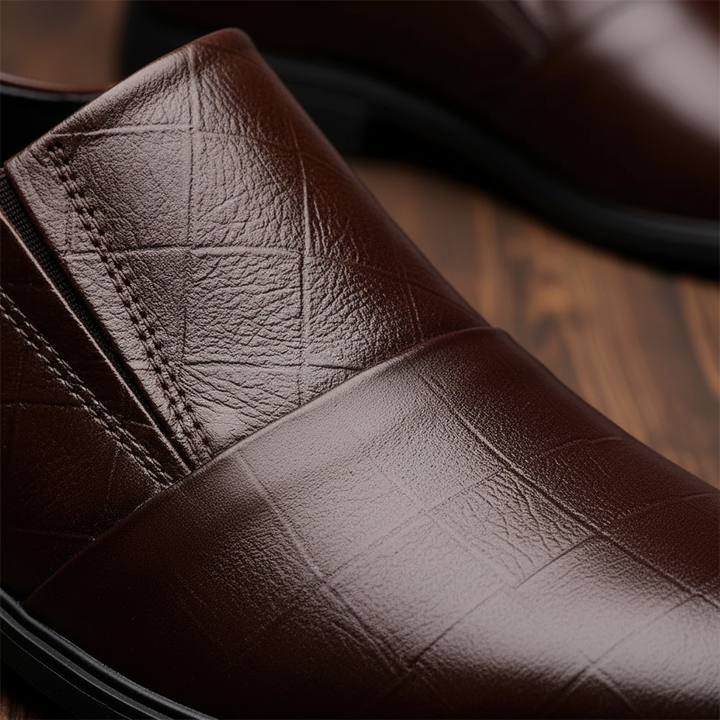 https://cdn.shopify.com/s/files/1/0830/7487/5738/files/freepik__macro-closeup-of-dress-shoe-made-from-full-grain-l__84069.png?v=1778082455