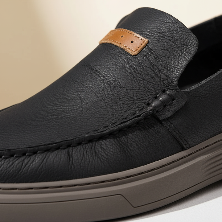 https://cdn.shopify.com/s/files/1/0830/7487/5738/files/freepik__macro-image-of-loafer-made-from-full-grain-leather__87652_b8ee9474-210f-49d8-a7ea-c91b41071824.png?v=1778082484