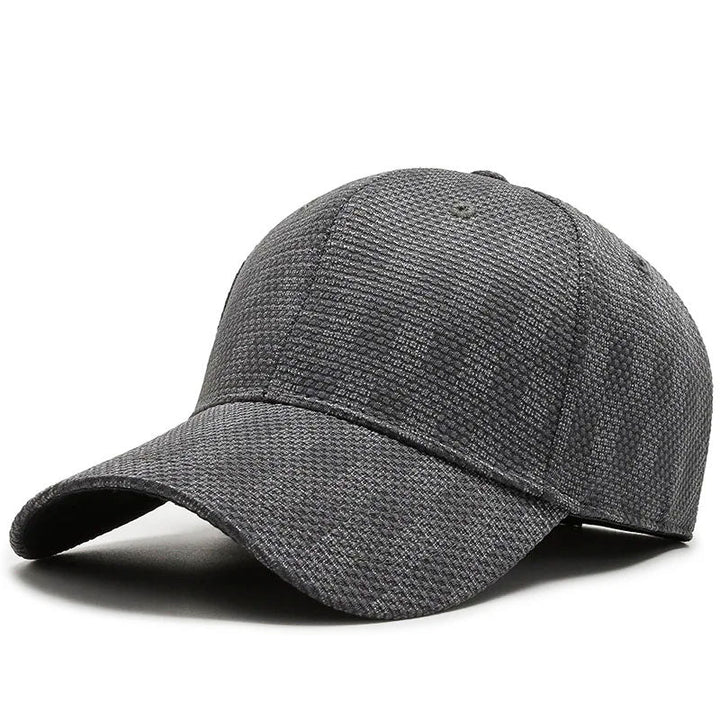 https://cdn.shopify.com/s/files/1/0830/7487/5738/files/gray_baseball_cap.jpg?v=1773741551