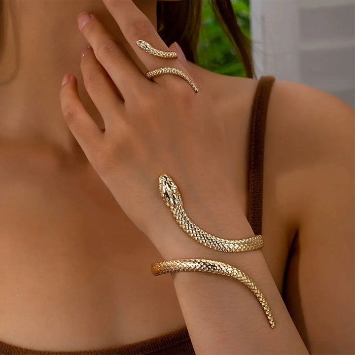 https://cdn.shopify.com/s/files/1/0830/7487/5738/files/s383_snake_gold.jpg?v=1773741555